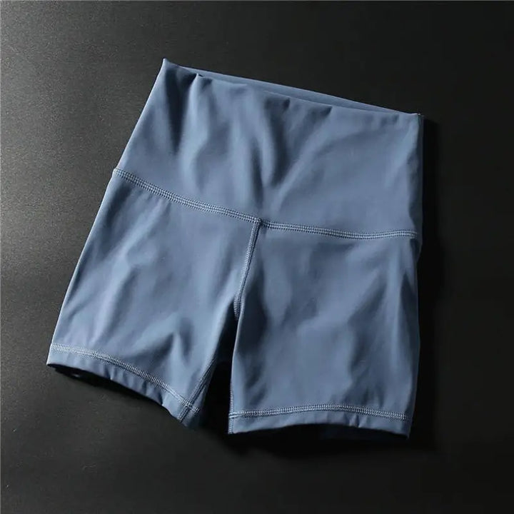 Pair of blue athletic shorts with a high waistband.