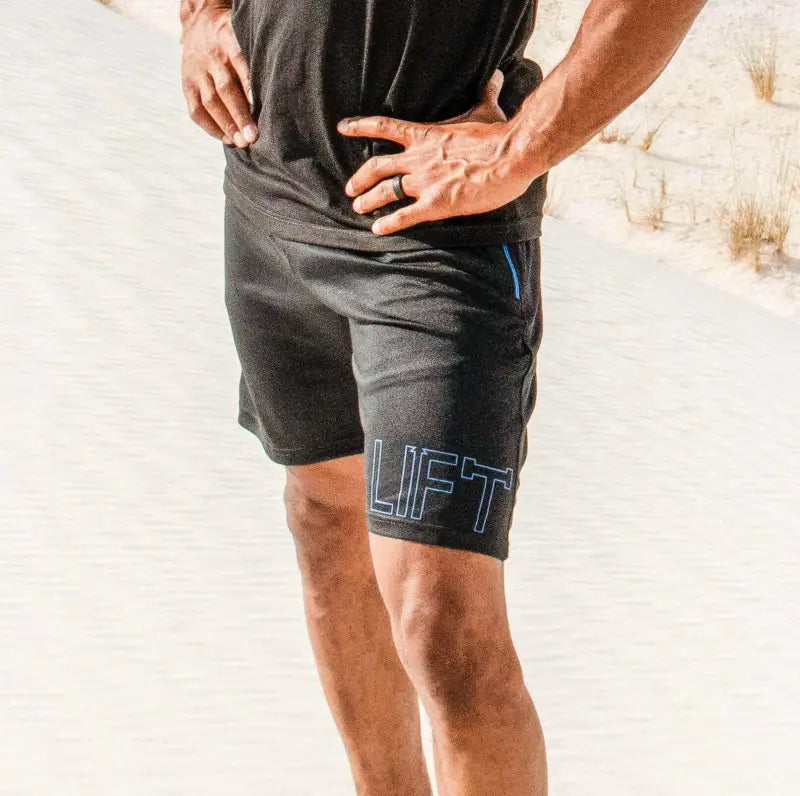 Athletic shorts with ’LIFT’ printed on the side.