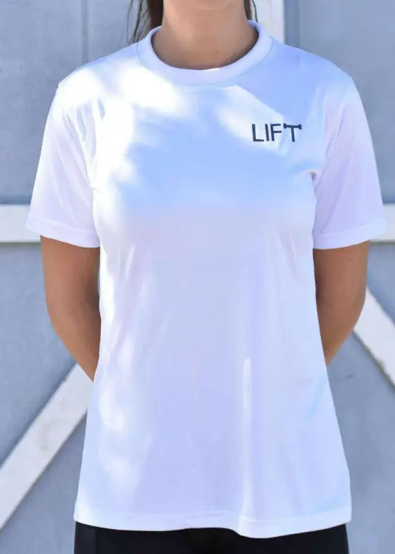 White t-shirt with ’LIFT’ printed on the chest.