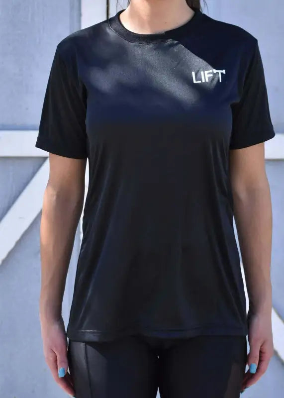 Black t-shirt with ’LIFT’ printed in white on the chest.