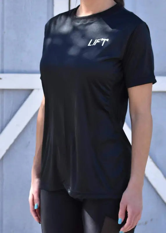 Black t-shirt with ’LIFT’ printed on the chest.