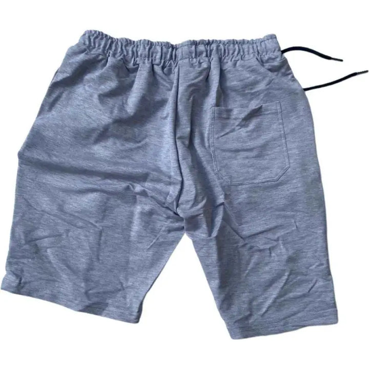 Gray athletic shorts with an elastic waistband and drawstring.